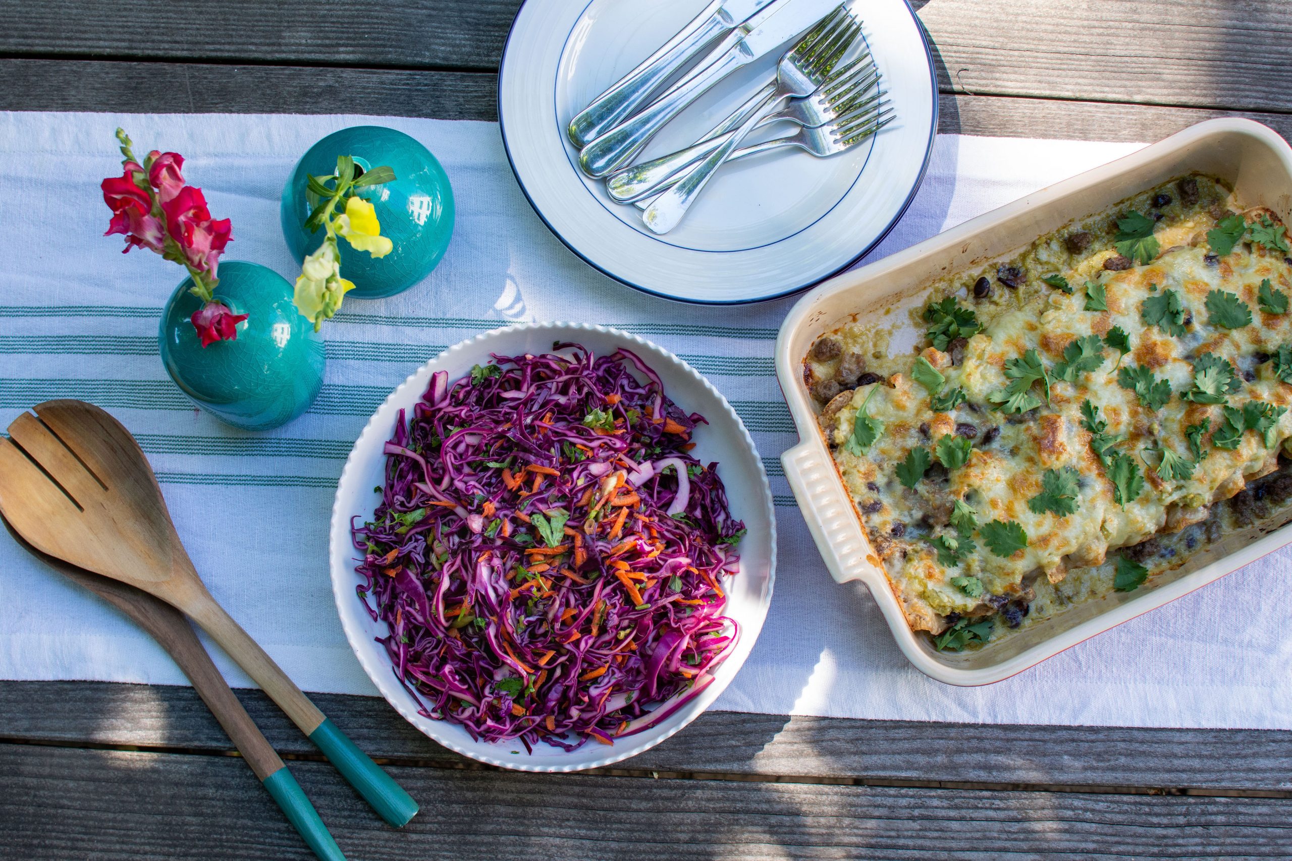 Dinner Table set with enchiladas and slaw